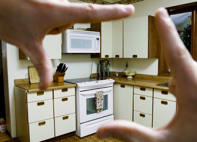 looking at an old, outdated kitchen