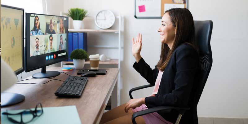 woman having video conference in home office