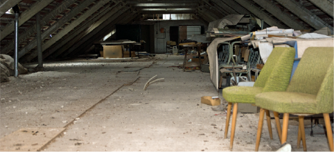 cluttered attic with old furniture