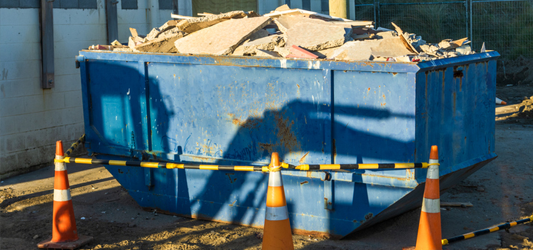 Dumpster full of concrete