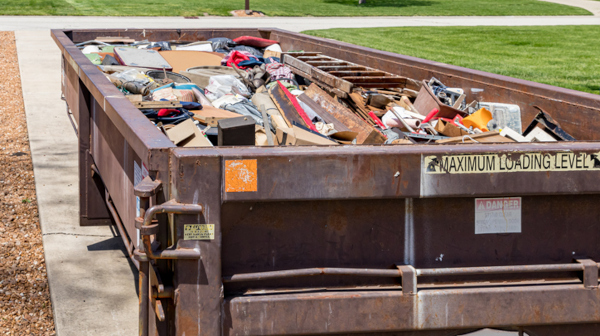 Dumpster filled with waste and debris