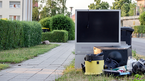 pile of household junk set out at the road