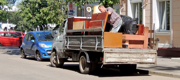 furniture loaded onto truck and hauled away