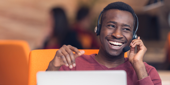 junk removal admin answering the phone with friendly smile