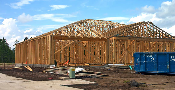 New house being constructed with a dumpster on-site