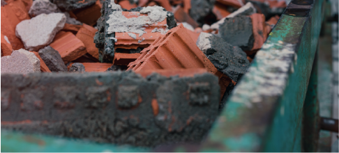 bricks in a dumpster