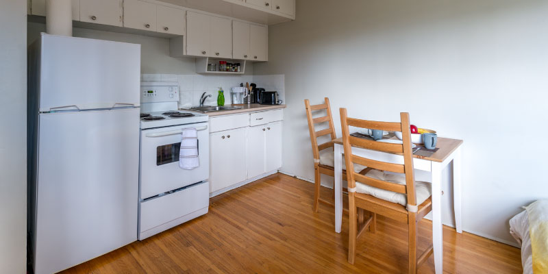 outdated white appliances in apartment