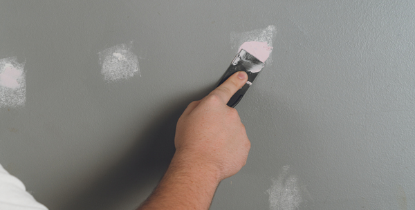 Patch drywall before painting walls