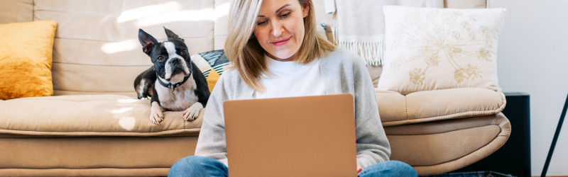 woman using laptop at home