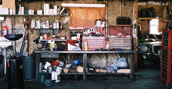 messy cluttered garage Rent a dumpster for garage cleanout