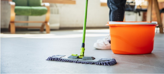 mopping clean floor in decluttered home