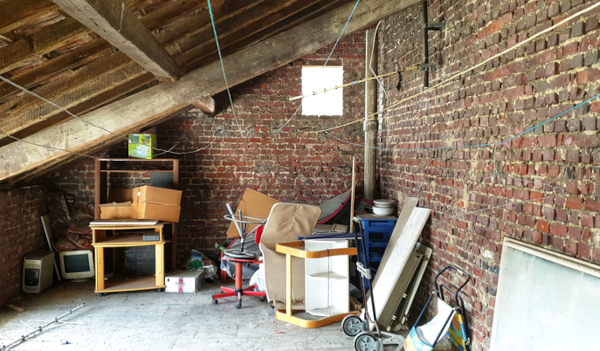 attic with discarded furniture