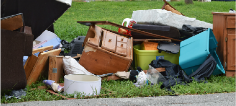 junk sitting out at curb for pick-up